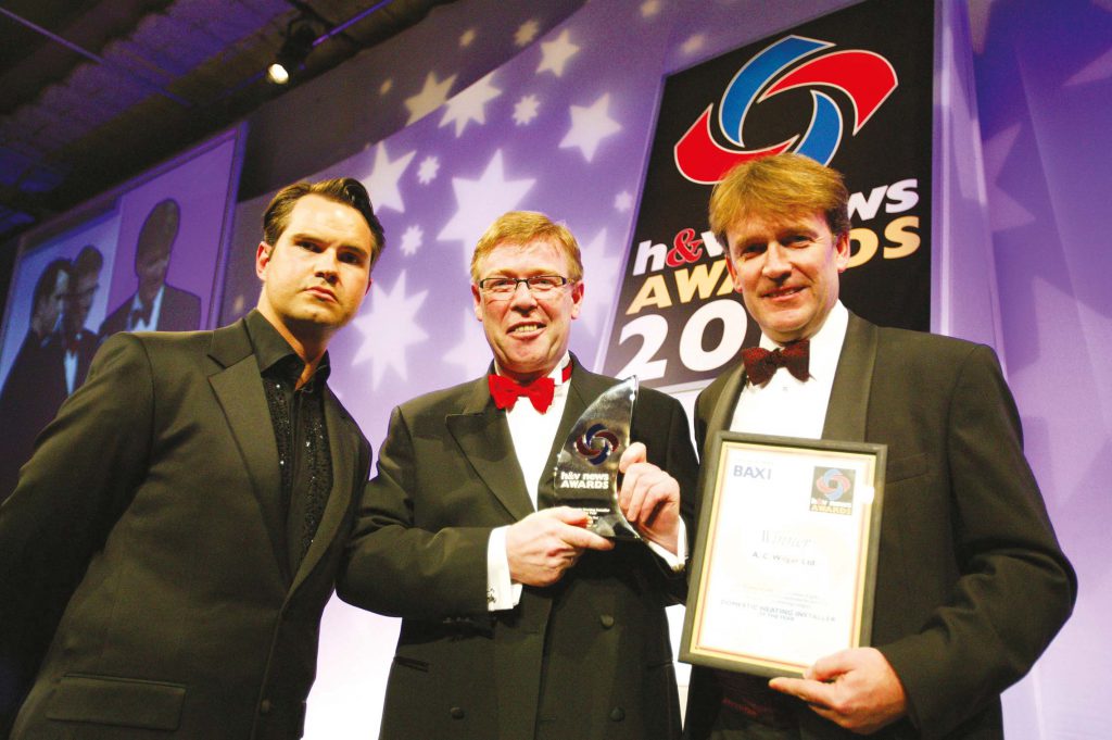 Surefire Plumbing wins "Smart installer" of the year at H&V News Awards 2016 with Billy Wilgar and Jimmy Carr