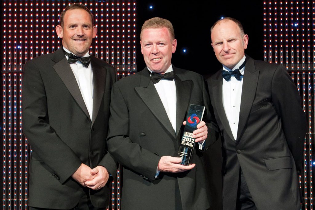 Surefire Plumbing wins "Domestic installer" of the year at H&V News Awards 2012 with Billy Wilgar
