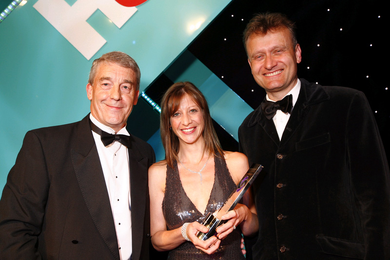 Surefire Plumbing wins "Domestic installer" of the year at H&V News Awards 2011 with Sally Wilgar and Hugh Dennis