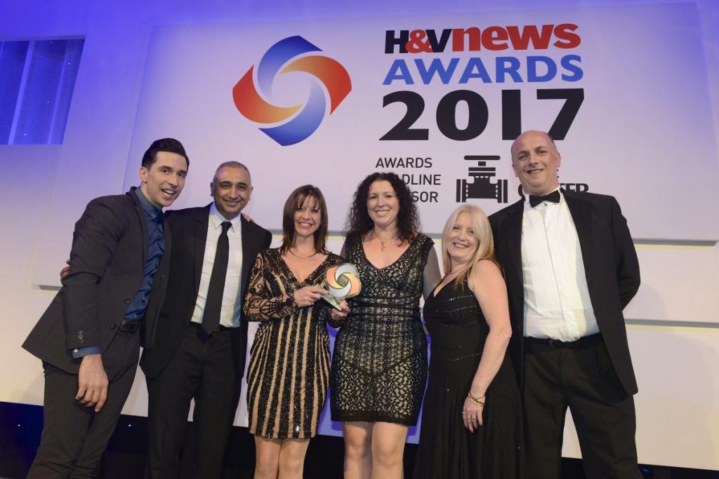 Surefire Plumbing wins "Smart installer" of the year at H&V News Awards 2017 with Sally Wilgar and Russell Kane